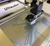 A 3D printer at work.