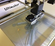 A 3D printer at work.