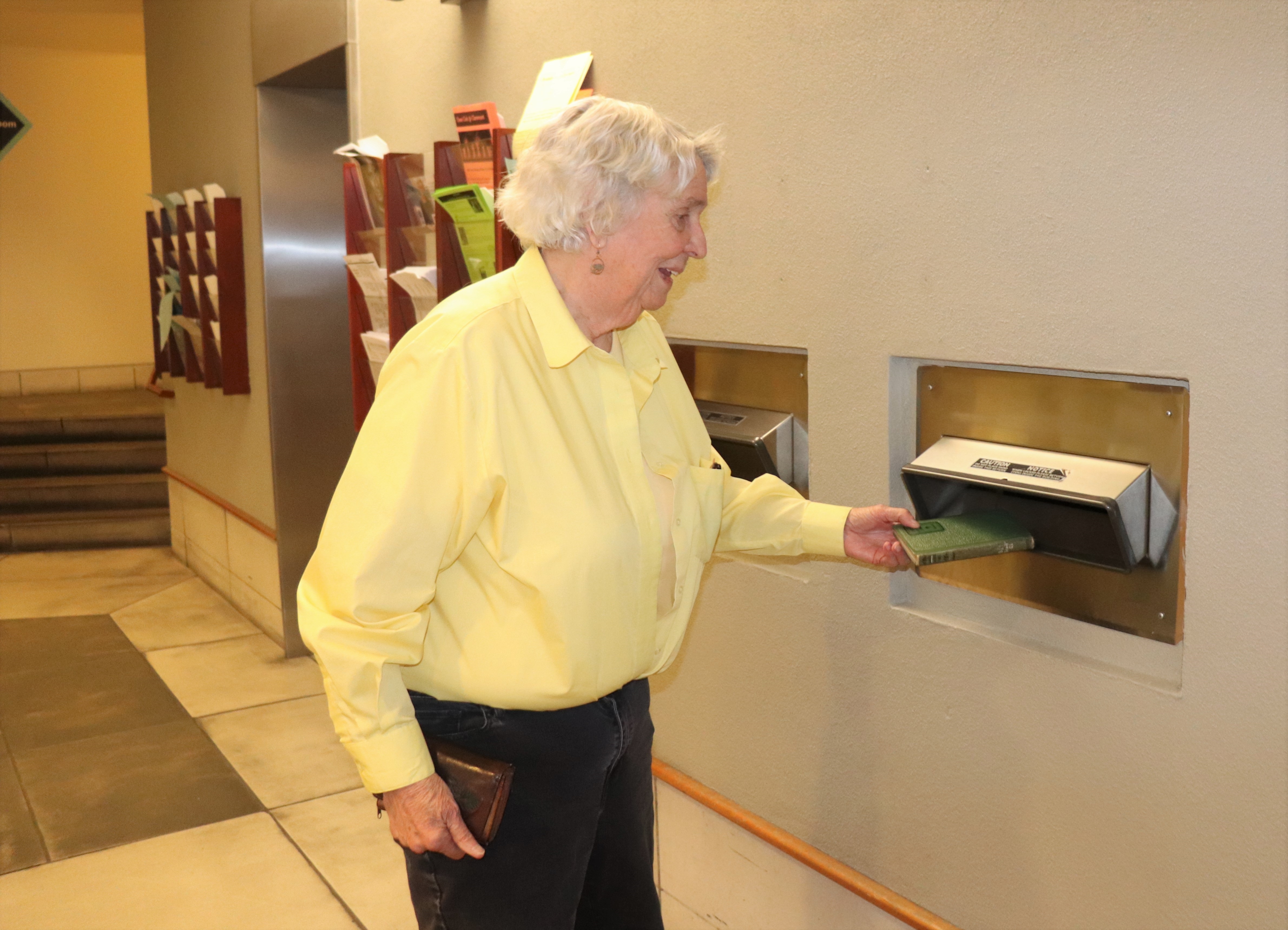 pic of patron returning book