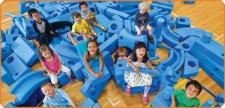 children playing with big foam blocks