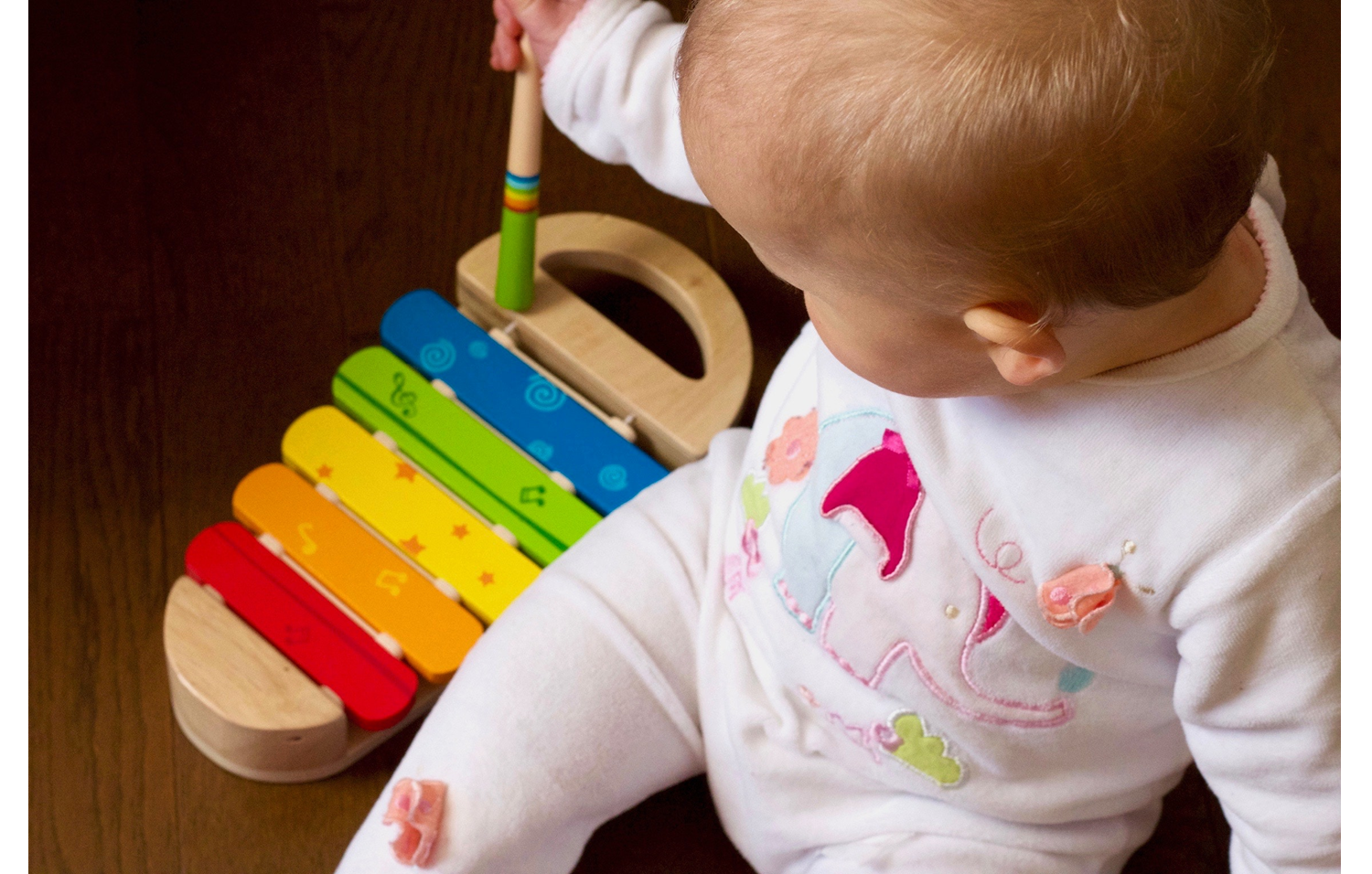 Toddler Storytime Baby playing musical instrument