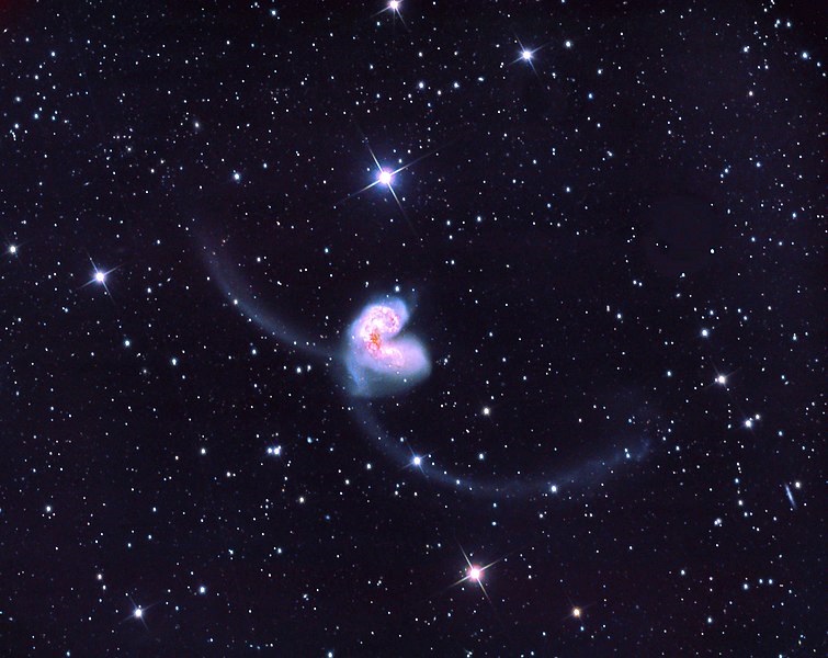 The long tails of these two colliding galaxies resemble an insect's antennae.