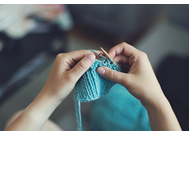 hands knitting yarn