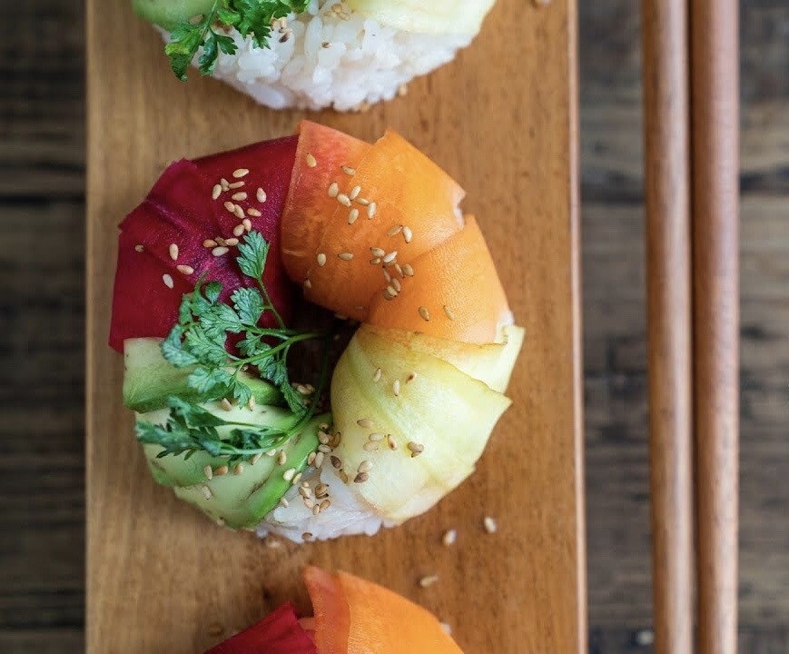 Close-up of a donut shaped sushi treat