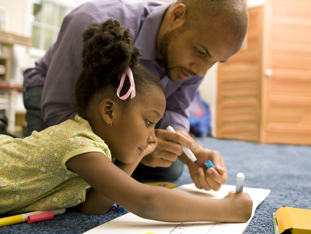 PCW Father helping his young daughter