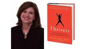 Woman in Red Posing with a Red Book

