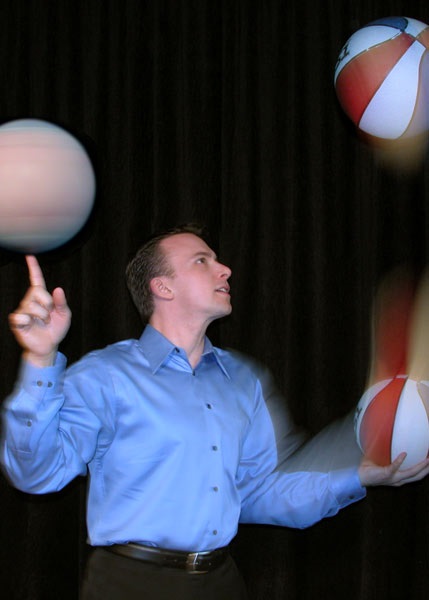 Father and Child Using Laptop Together

