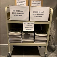 Tax Forms on a Book Cart