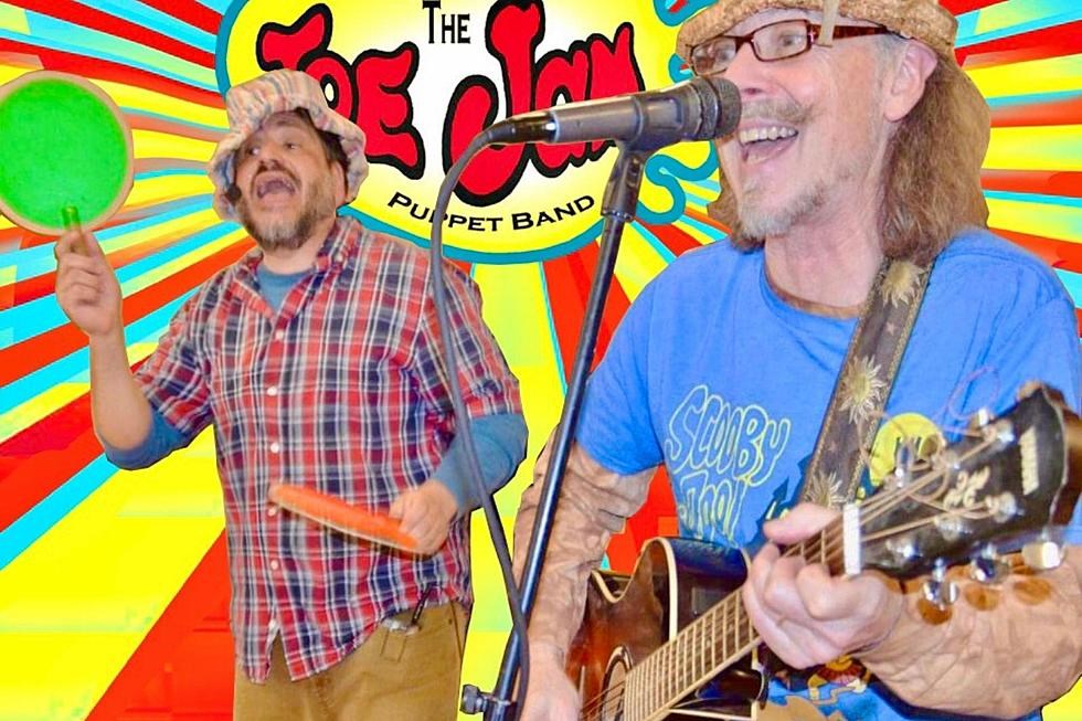 Child Reading a Book Outdoors in the Fall