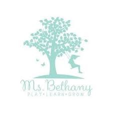 Child Reading a Book Outdoors in the Fall