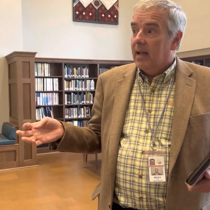 Waukesha Public Library Director, Bruce, giving a tour of the Andrew Carnegie Library area.