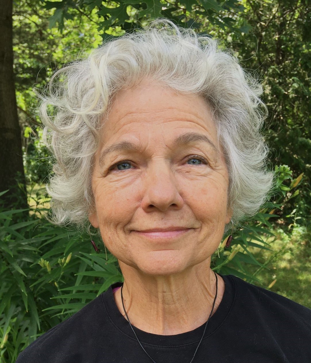 Photo of Dr. Barbara Reinhart looking into the camera.