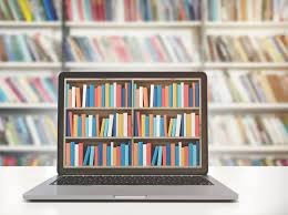 Image of a laptop opened to an image of library book shelves
