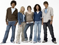Five teens standing in a row