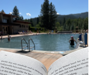 Image of a book by a pool