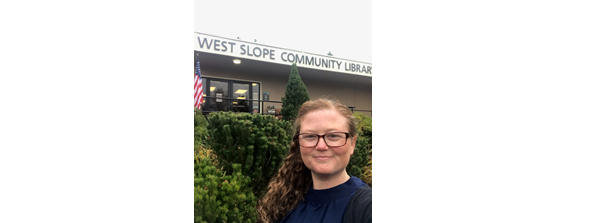 Photo of Kristen Thorp in front of West Slope Library