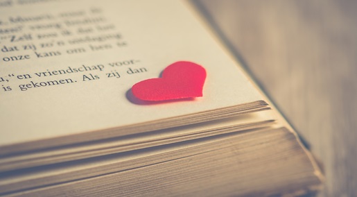 corner of book with a heart