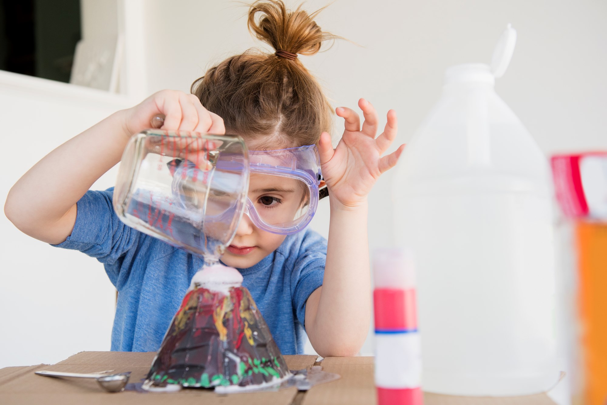 young girl doing a science experiment