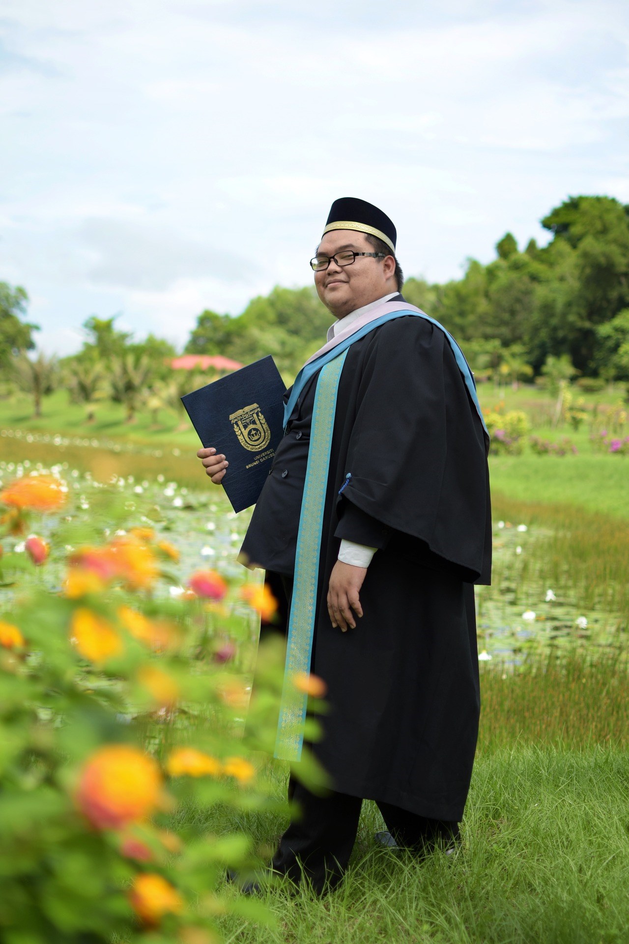 person holding diploma