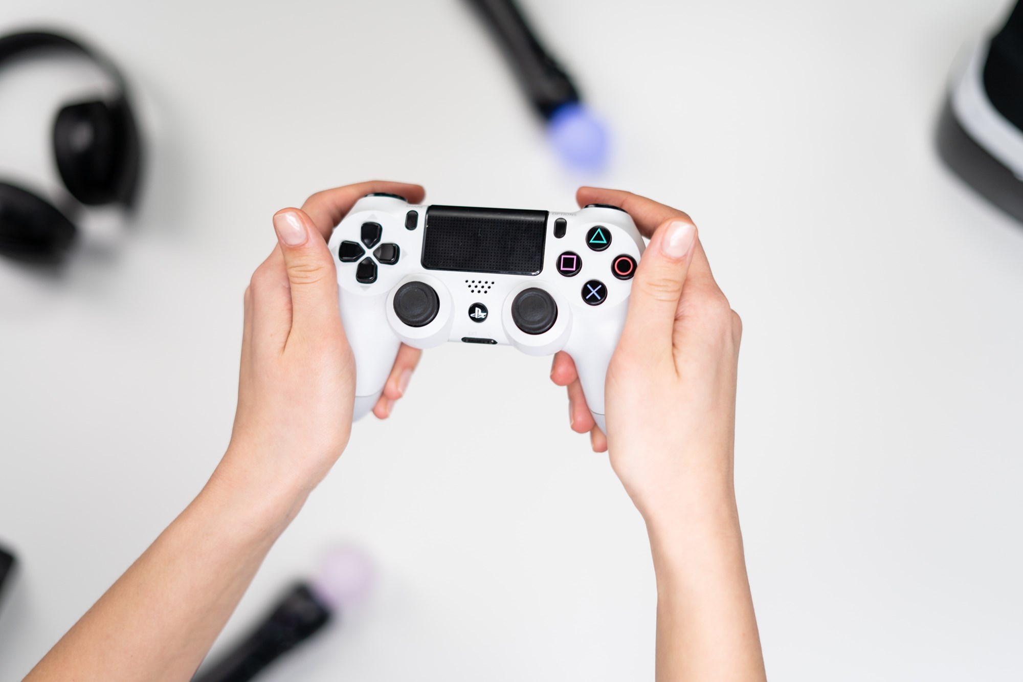 Hands Holding a Video Game Controller