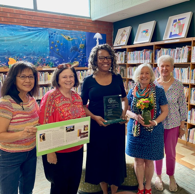 librarian Diane Walker receiving an award