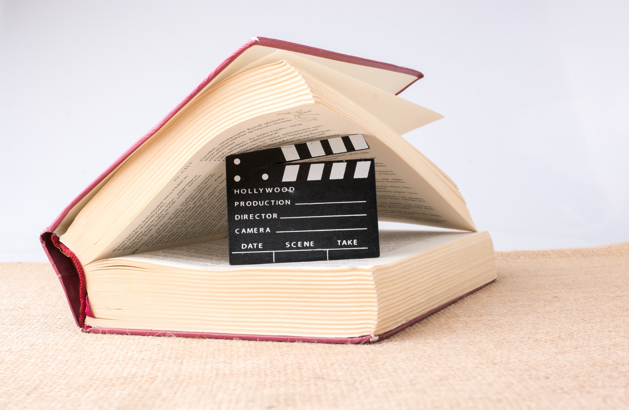 movie clapper in a book