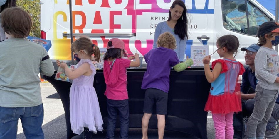 Young Girl Reading an Open Book in the Library