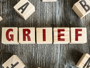 blocks that spell out GRIEF