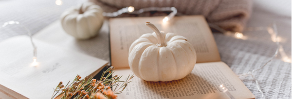 white pumpkin on a book