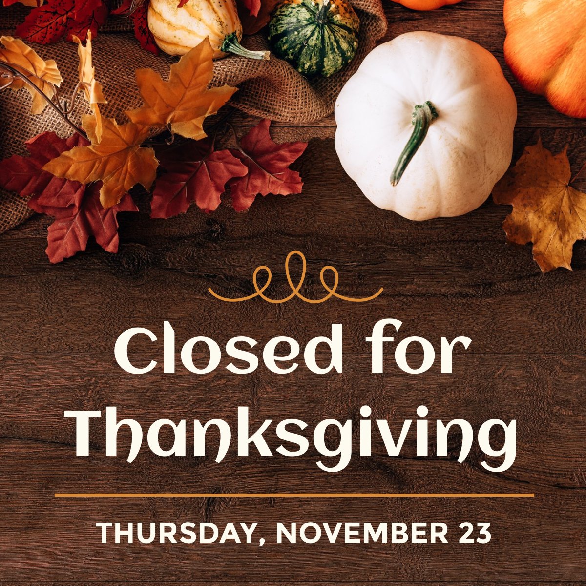 Closed for Thanksgiving Thursday, November 23. Background features leaves, pumpkins and gourds scattered on a wooden table.