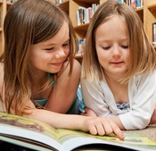 Two children reading.