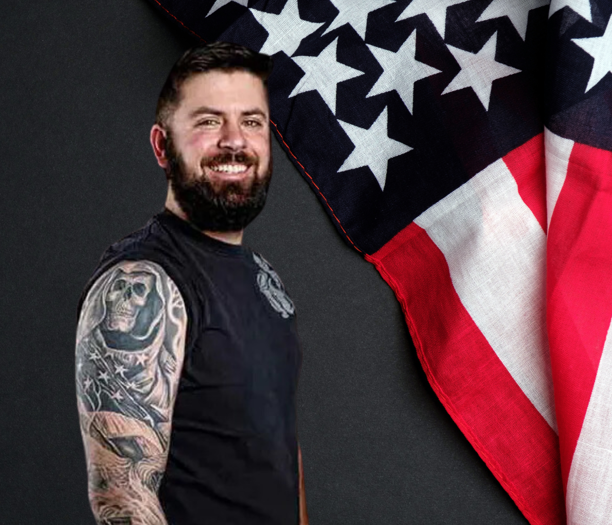Photo from an image in the Warrior Ink Traveling Exhibit of a soldier with tattoos on their arm.