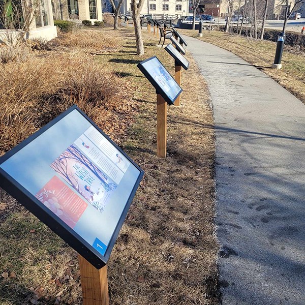 Photo of Hartland Public Library's Storytrail along the Ice Age Trail outside the library building.