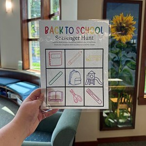 Photo of a hand holding the Back to School Scavenger Hunt sheet inside the Dwight Foster Public Library. Photo of a hand holding the Back to School Scavenger Hunt sheet inside the Dwight Foster Public Library.