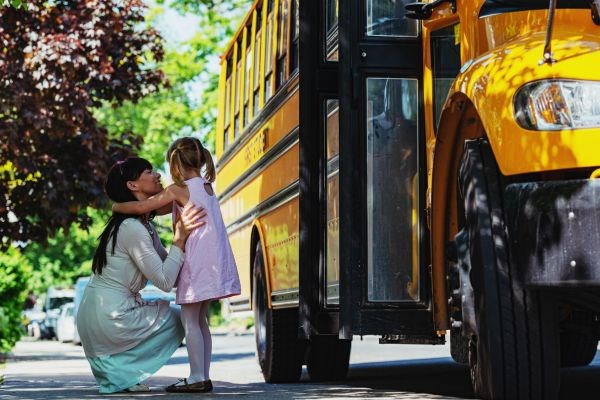 Parent and Child by School Bus