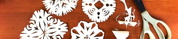 paper snowflakes and scissors