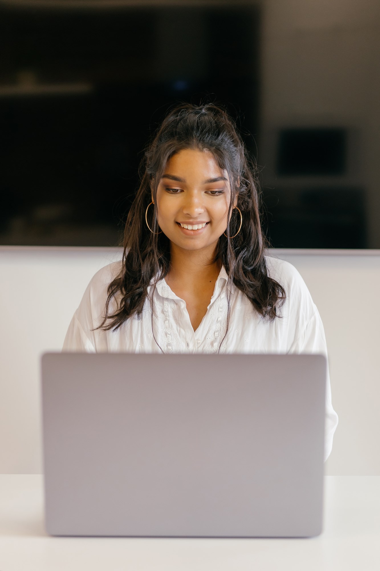 Teen using a laptop