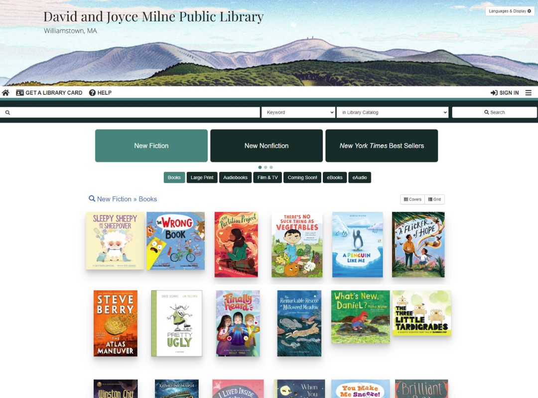 Screenshot of the new library online catalog. The header shows artwork depicting Mount Greylock, and beneath is an array of highlighted new books.