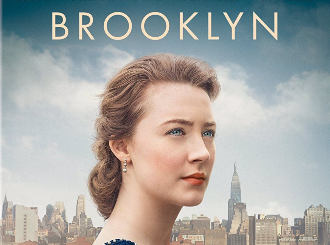 A portion of the DVD cover for the movie Brooklyn, featuring Saoirse Ronan as the protagonist.