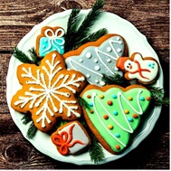 Frosted and decorated holiday cookies on a plate. The calendar search this linked image goes to will open in an external site and in a new tab or window.