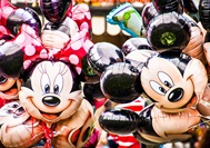 Minnie and Mickey Mouse balloons.