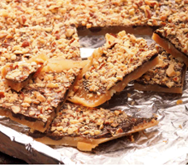A cookie sheet full of homemade toffee. The candy making event this linked image will take you to will open an external site in a new tab or window.